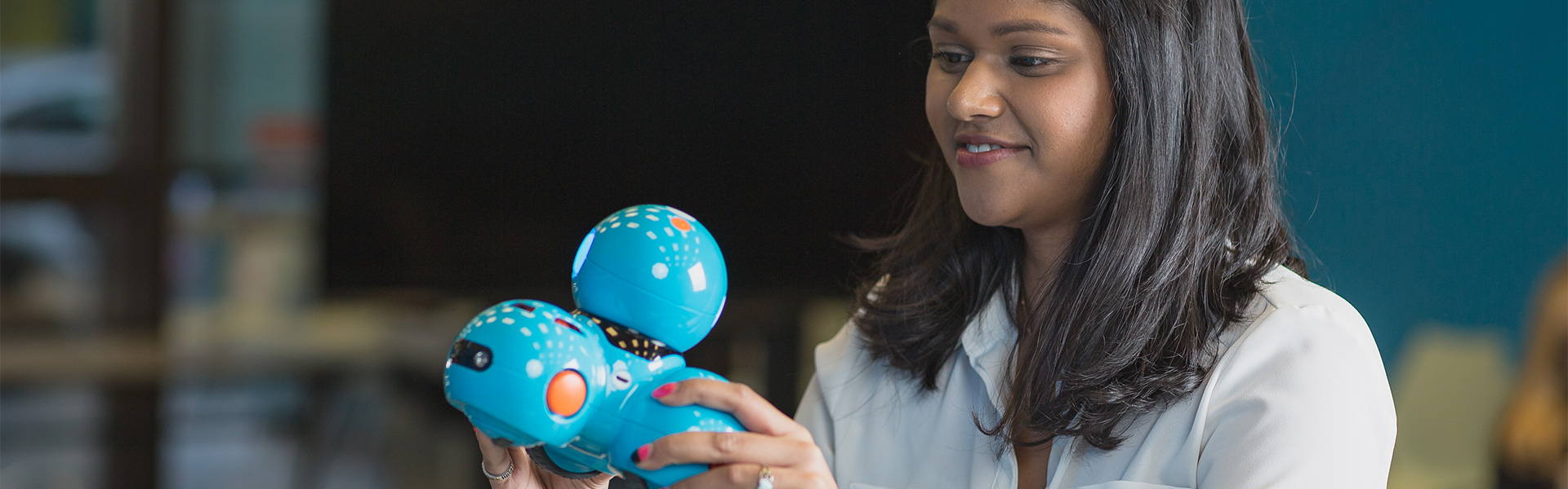 Student working with an educational robot