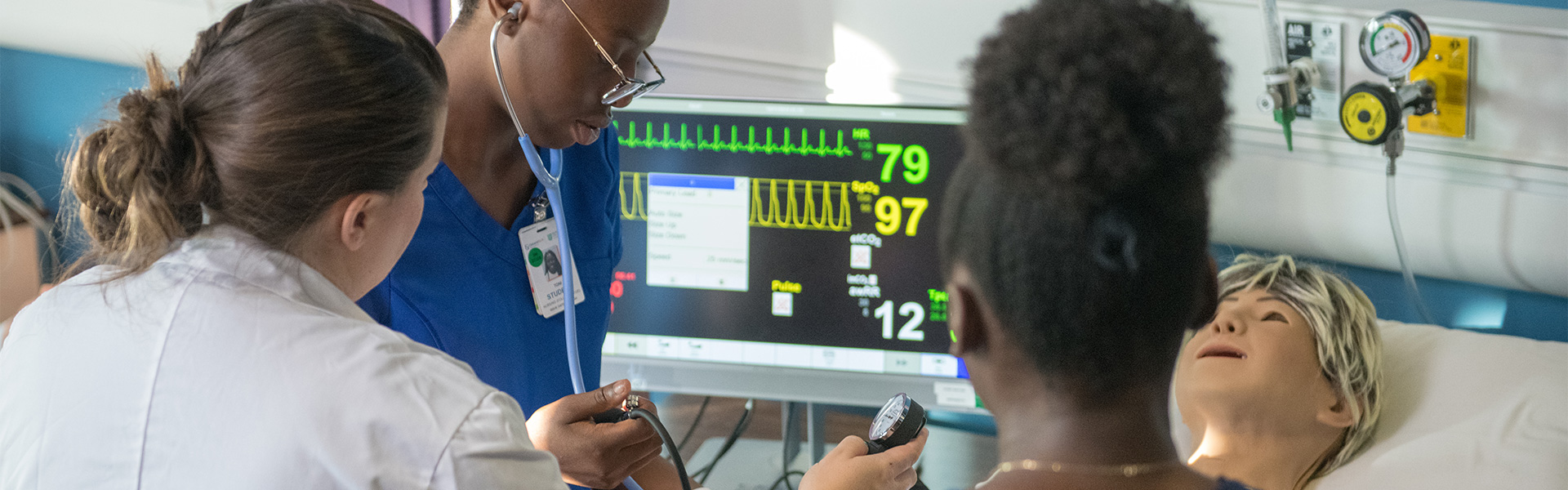 Nursing students in a clinical sim lab