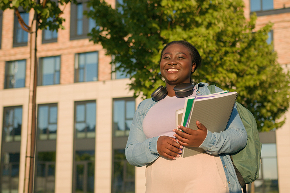 Student standing on campus