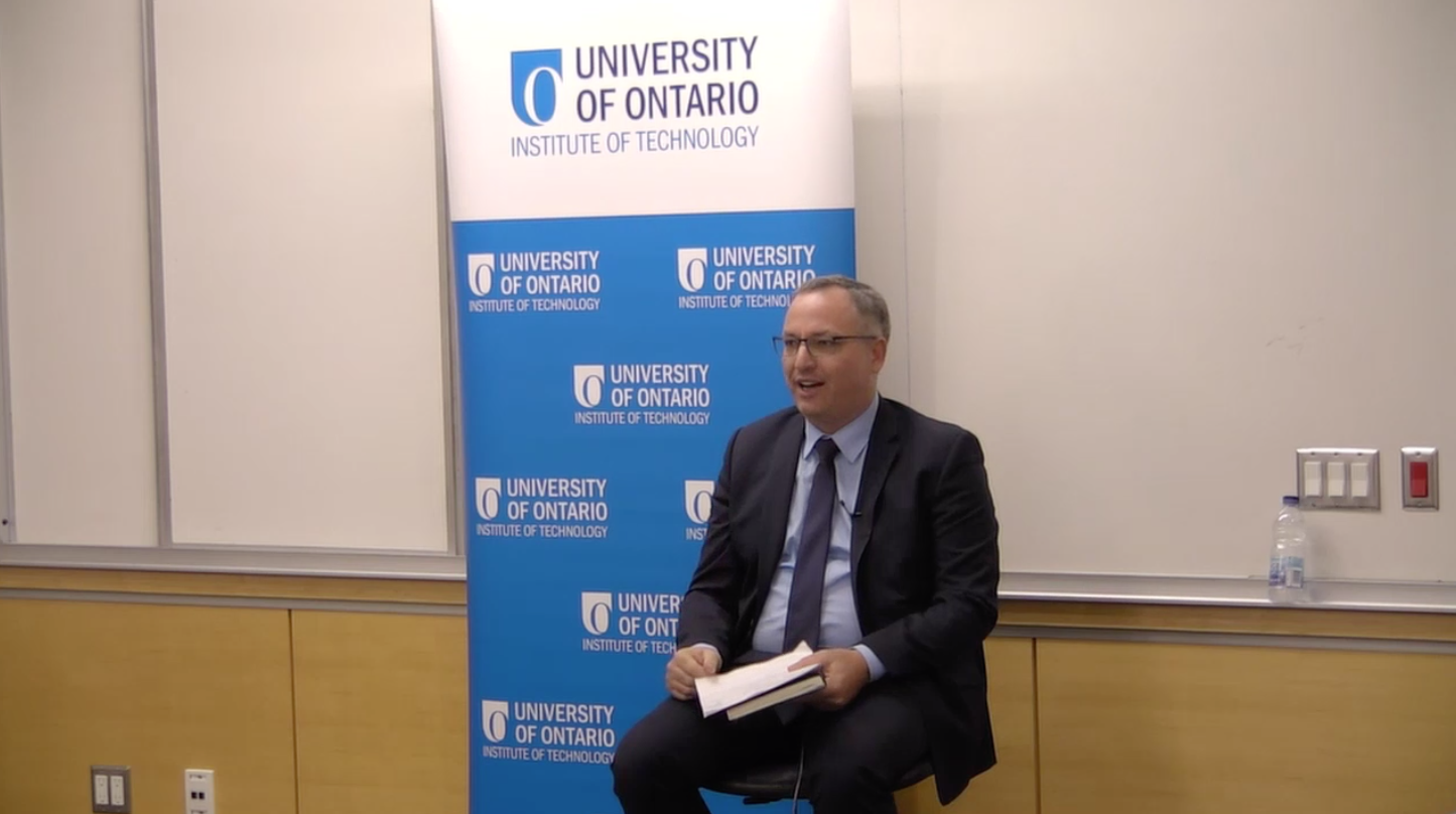 Dr. Steven Murphy speaking in a lecture room for the "ONTechU Discussions with President Steven" event
